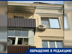 «Ждите понедельника»: УК «Монолит» не увидела угрозы в нависшей над окном новочеркасцев кровле 